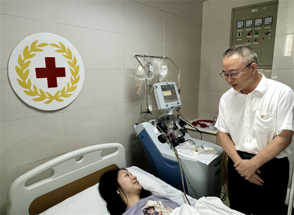 “我希望把爱心传递下去”